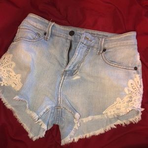 High waisted light wash denim shorts